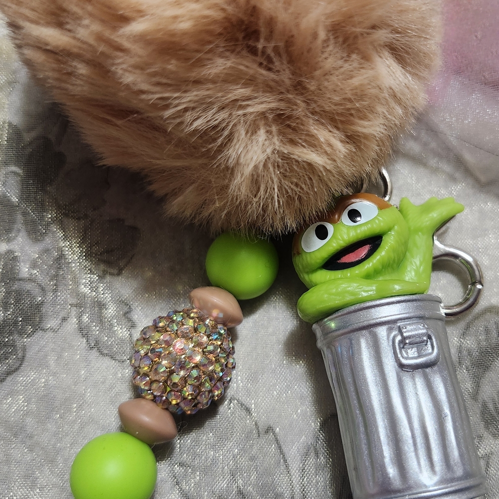 Green and Silver Key Holder with Plush Accent